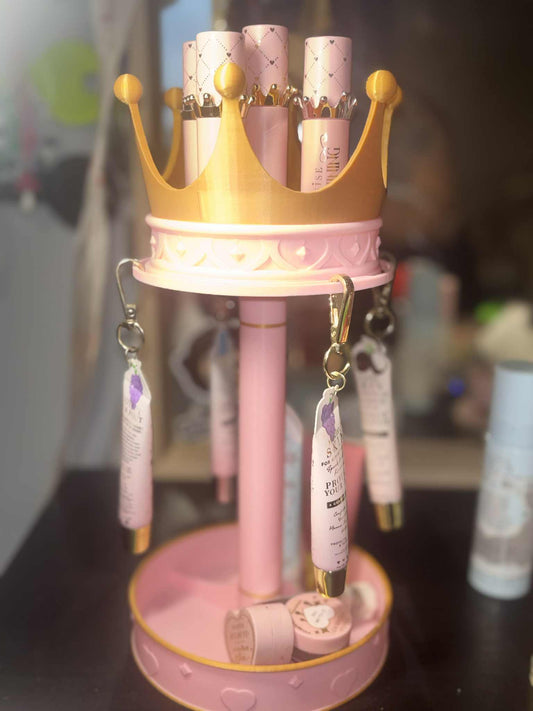 PLouise carousel makeup display with extra storage in base